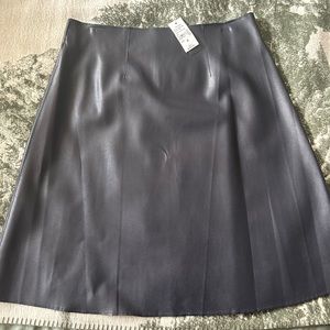 Never warn faux leather skirt